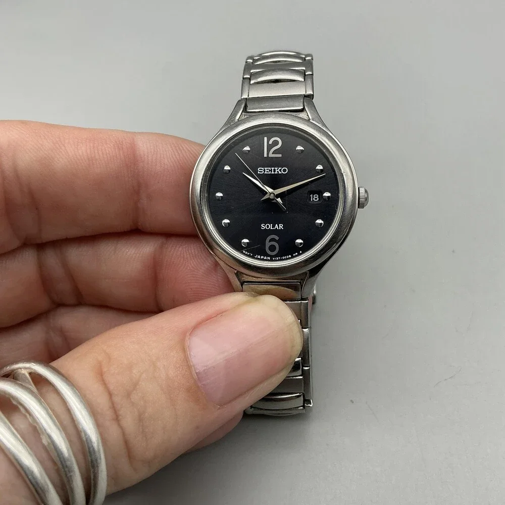 Seiko Solar Womens Watch 28mm Black Dial Silver Tone Stainless Stretch Bracelet